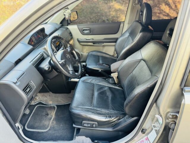 Серый Ниссан ИксТрейл, объемом двигателя 2.2 л и пробегом 238 тыс. км за 4250 $, фото 11 на Automoto.ua