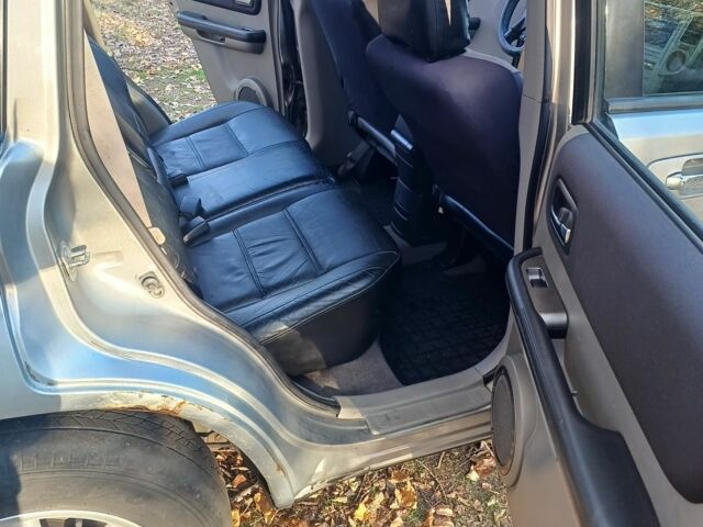 Сірий Ніссан ІксТрейл, об'ємом двигуна 2.2 л та пробігом 313 тис. км за 4500 $, фото 10 на Automoto.ua