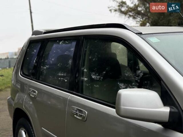 Серый Ниссан ИксТрейл, объемом двигателя 2.18 л и пробегом 280 тыс. км за 5850 $, фото 18 на Automoto.ua