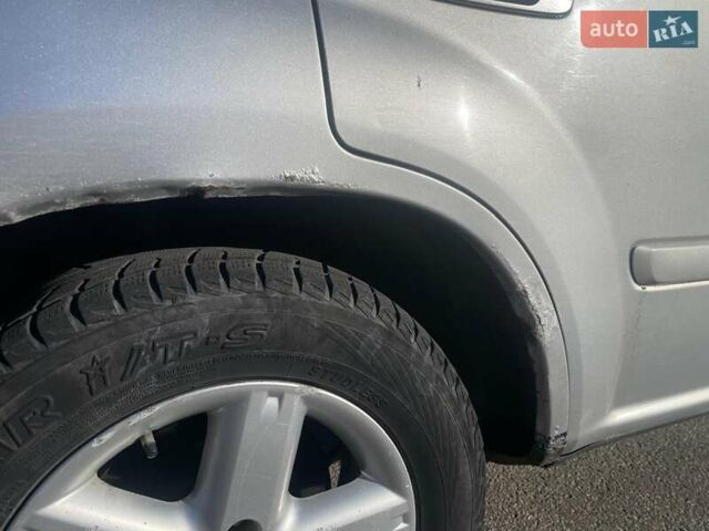 Серый Ниссан ИксТрейл, объемом двигателя 2.18 л и пробегом 405 тыс. км за 5500 $, фото 1 на Automoto.ua