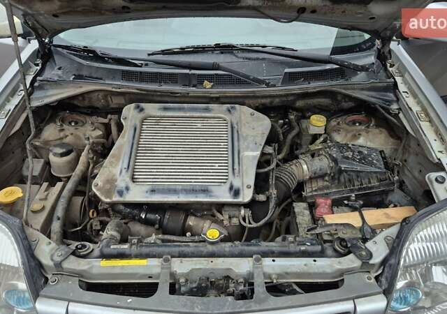 Серый Ниссан ИксТрейл, объемом двигателя 2.2 л и пробегом 490 тыс. км за 6000 $, фото 1 на Automoto.ua