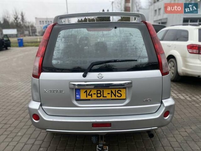 Серый Ниссан ИксТрейл, объемом двигателя 2.2 л и пробегом 272 тыс. км за 4500 $, фото 4 на Automoto.ua