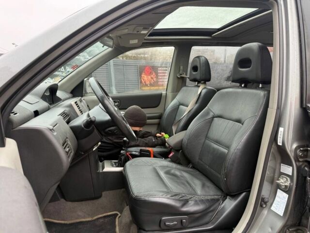 Серый Ниссан ИксТрейл, объемом двигателя 2.2 л и пробегом 240 тыс. км за 5223 $, фото 7 на Automoto.ua