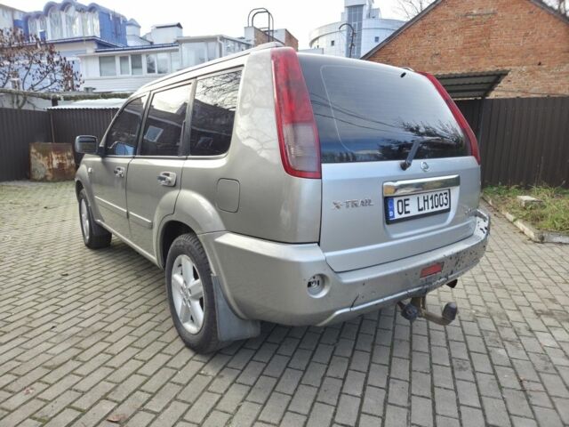 Серый Ниссан ИксТрейл, объемом двигателя 2.2 л и пробегом 280 тыс. км за 4164 $, фото 4 на Automoto.ua