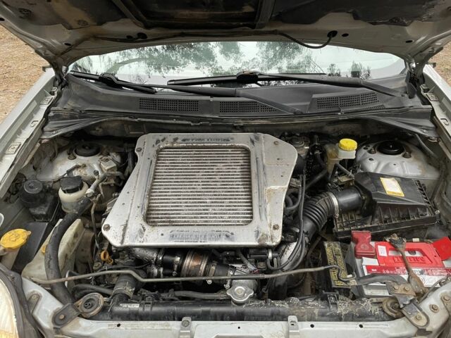 Сірий Ніссан ІксТрейл, об'ємом двигуна 0.22 л та пробігом 188 тис. км за 4800 $, фото 17 на Automoto.ua