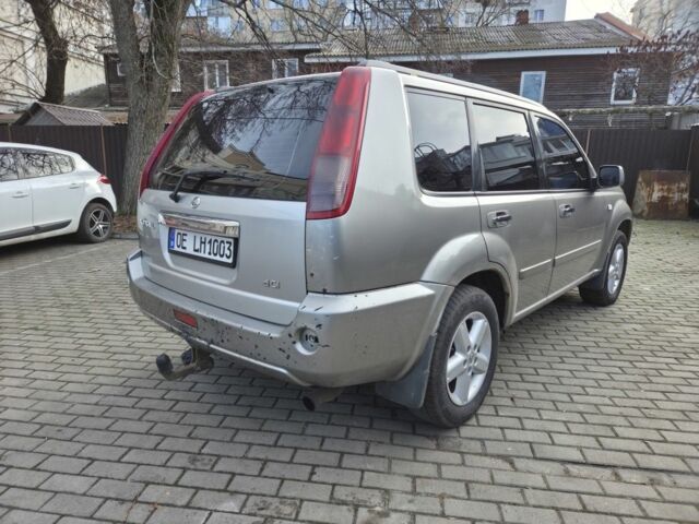 Серый Ниссан ИксТрейл, объемом двигателя 2.2 л и пробегом 280 тыс. км за 4164 $, фото 3 на Automoto.ua