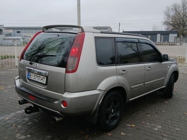 Серый Ниссан ИксТрейл, объемом двигателя 2.2 л и пробегом 302 тыс. км за 5199 $, фото 3 на Automoto.ua