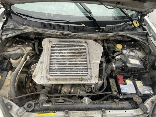 Серый Ниссан ИксТрейл, объемом двигателя 2.2 л и пробегом 287 тыс. км за 4750 $, фото 22 на Automoto.ua