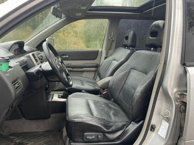 Серый Ниссан ИксТрейл, объемом двигателя 2.2 л и пробегом 287 тыс. км за 4750 $, фото 12 на Automoto.ua