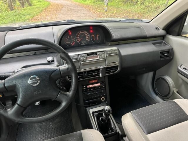 Серый Ниссан ИксТрейл, объемом двигателя 2.2 л и пробегом 240 тыс. км за 3100 $, фото 15 на Automoto.ua