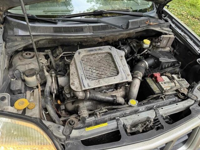 Серый Ниссан ИксТрейл, объемом двигателя 2.2 л и пробегом 240 тыс. км за 3100 $, фото 16 на Automoto.ua