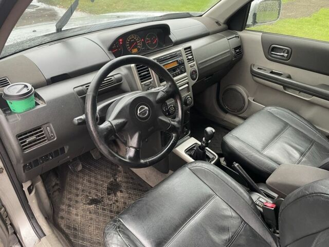 Серый Ниссан ИксТрейл, объемом двигателя 2.2 л и пробегом 287 тыс. км за 4750 $, фото 11 на Automoto.ua