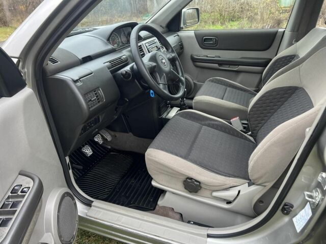 Серый Ниссан ИксТрейл, объемом двигателя 2.2 л и пробегом 261 тыс. км за 4400 $, фото 7 на Automoto.ua