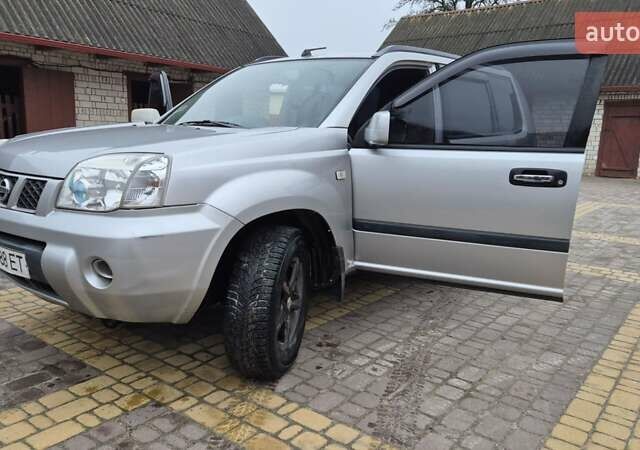 Серый Ниссан ИксТрейл, объемом двигателя 2.2 л и пробегом 490 тыс. км за 6000 $, фото 25 на Automoto.ua