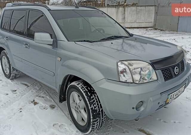 Сірий Ніссан ІксТрейл, об'ємом двигуна 2 л та пробігом 290 тис. км за 6000 $, фото 7 на Automoto.ua