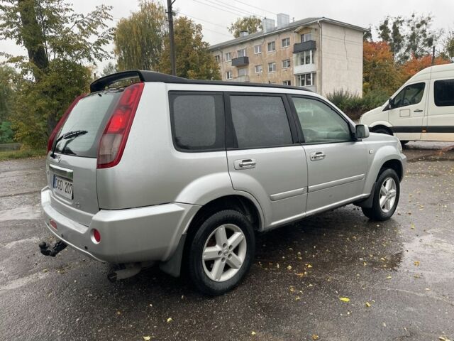 Серый Ниссан ИксТрейл, объемом двигателя 2.2 л и пробегом 287 тыс. км за 4750 $, фото 4 на Automoto.ua