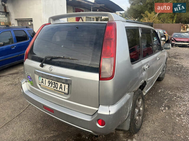 Серый Ниссан ИксТрейл, объемом двигателя 2.5 л и пробегом 250 тыс. км за 3899 $, фото 5 на Automoto.ua