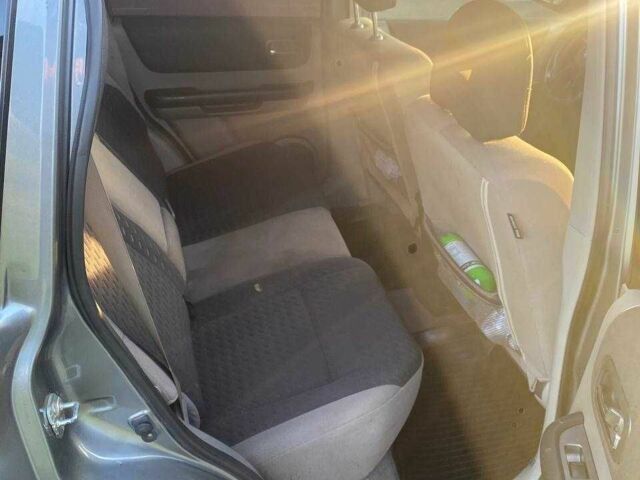 Серый Ниссан ИксТрейл, объемом двигателя 2.2 л и пробегом 337 тыс. км за 4700 $, фото 5 на Automoto.ua