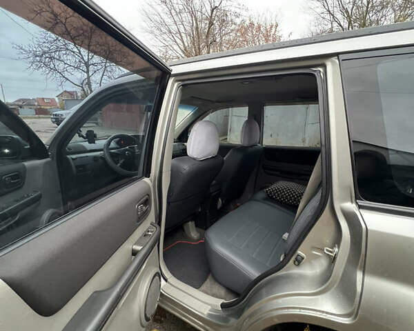 Серый Ниссан ИксТрейл, объемом двигателя 2 л и пробегом 170 тыс. км за 7400 $, фото 14 на Automoto.ua