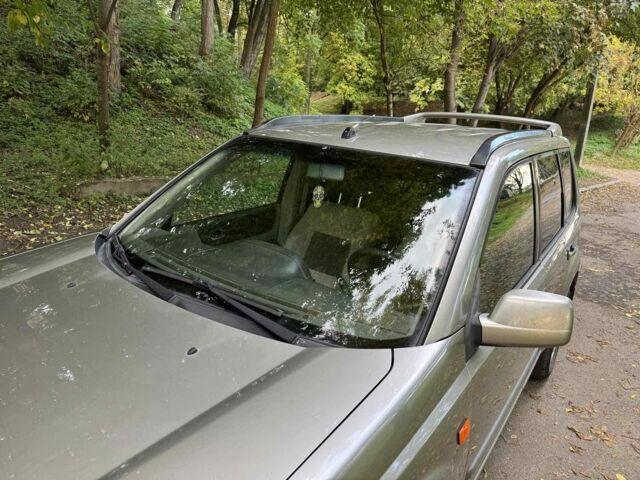 Серый Ниссан ИксТрейл, объемом двигателя 2.2 л и пробегом 240 тыс. км за 3100 $, фото 7 на Automoto.ua