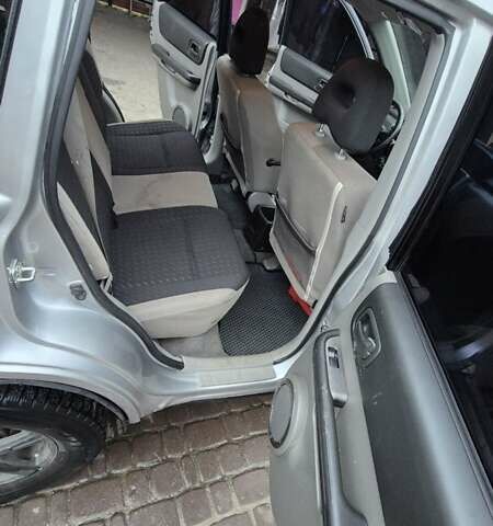 Серый Ниссан ИксТрейл, объемом двигателя 2.2 л и пробегом 490 тыс. км за 6000 $, фото 3 на Automoto.ua