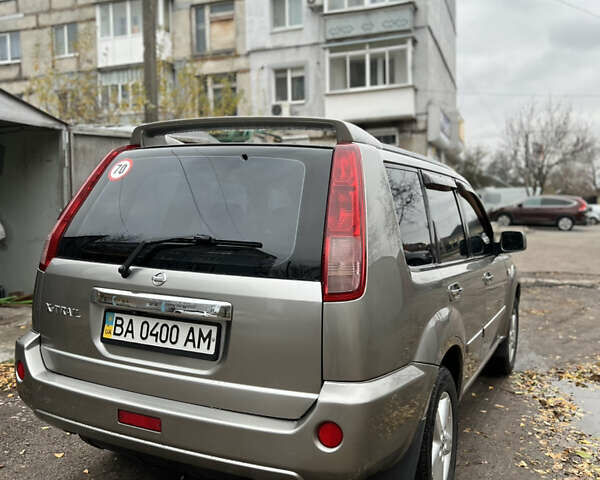 Серый Ниссан ИксТрейл, объемом двигателя 2 л и пробегом 170 тыс. км за 7400 $, фото 7 на Automoto.ua