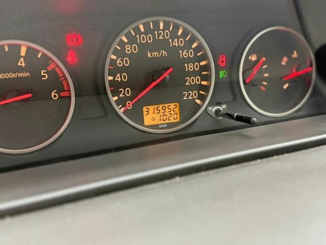 Сірий Ніссан ІксТрейл, об'ємом двигуна 2 л та пробігом 317 тис. км за 4000 $, фото 5 на Automoto.ua