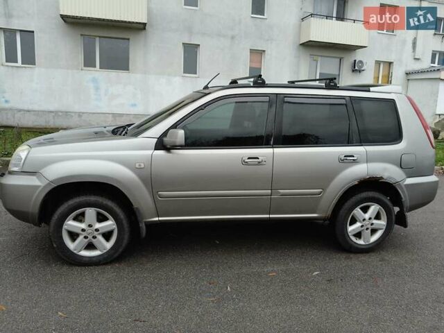 Серый Ниссан ИксТрейл, объемом двигателя 2 л и пробегом 270 тыс. км за 4196 $, фото 1 на Automoto.ua