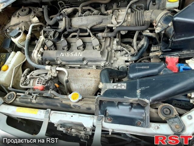 Серый Ниссан ИксТрейл, объемом двигателя 2 л и пробегом 210 тыс. км за 4500 $, фото 3 на Automoto.ua