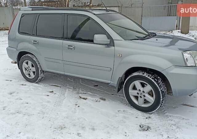 Сірий Ніссан ІксТрейл, об'ємом двигуна 2 л та пробігом 290 тис. км за 6000 $, фото 6 на Automoto.ua