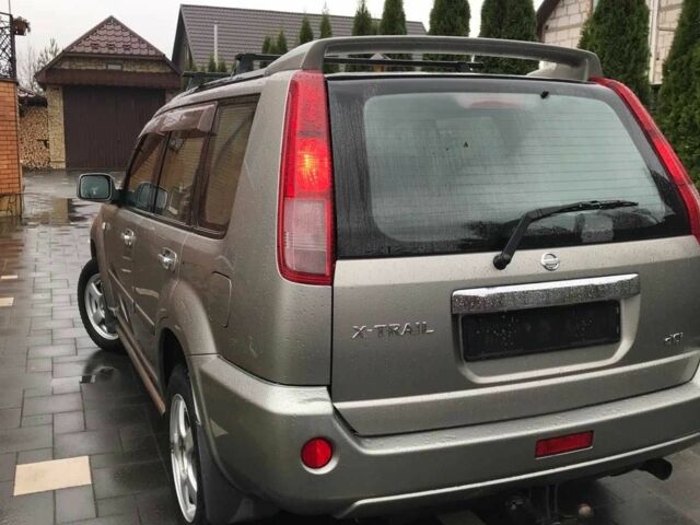 Серый Ниссан ИксТрейл, объемом двигателя 2.2 л и пробегом 188 тыс. км за 3850 $, фото 5 на Automoto.ua