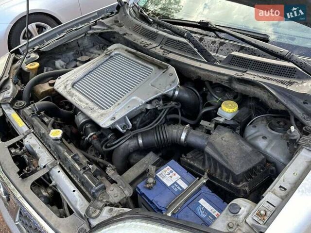 Серый Ниссан ИксТрейл, объемом двигателя 2.18 л и пробегом 300 тыс. км за 5500 $, фото 12 на Automoto.ua