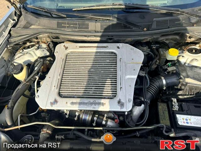 Сірий Ніссан ІксТрейл, об'ємом двигуна 2.2 л та пробігом 251 тис. км за 3600 $, фото 5 на Automoto.ua