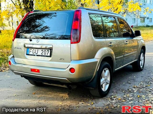 Серый Ниссан ИксТрейл, объемом двигателя 2.2 л и пробегом 238 тыс. км за 4250 $, фото 3 на Automoto.ua