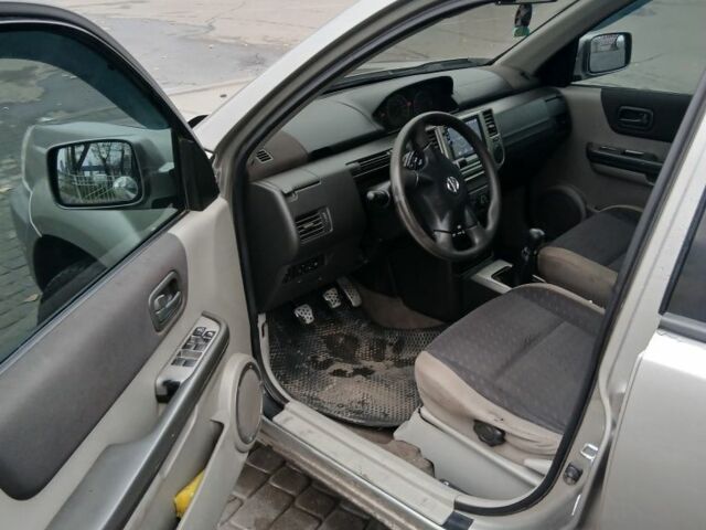 Серый Ниссан ИксТрейл, объемом двигателя 2.2 л и пробегом 302 тыс. км за 5199 $, фото 6 на Automoto.ua