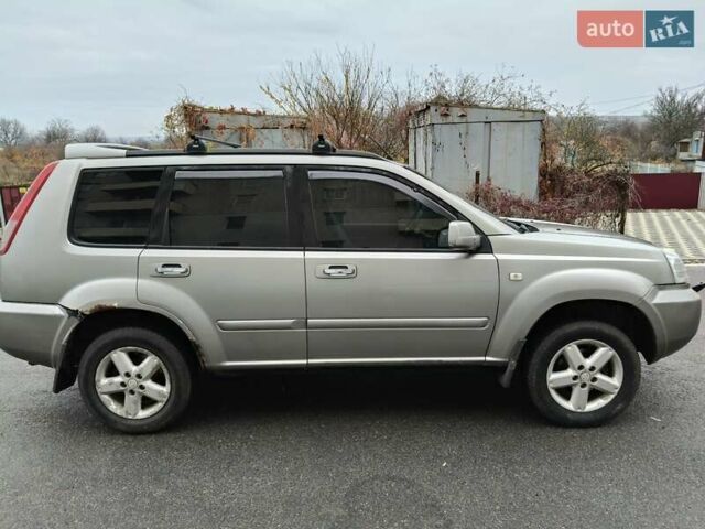 Серый Ниссан ИксТрейл, объемом двигателя 2 л и пробегом 270 тыс. км за 4196 $, фото 5 на Automoto.ua