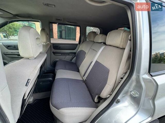 Серый Ниссан ИксТрейл, объемом двигателя 2 л и пробегом 209 тыс. км за 6800 $, фото 12 на Automoto.ua