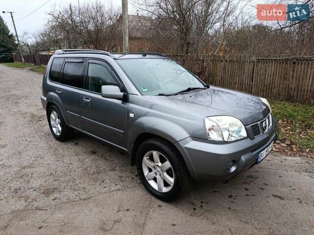 Сірий Ніссан ІксТрейл, об'ємом двигуна 2.49 л та пробігом 211 тис. км за 7500 $, фото 2 на Automoto.ua