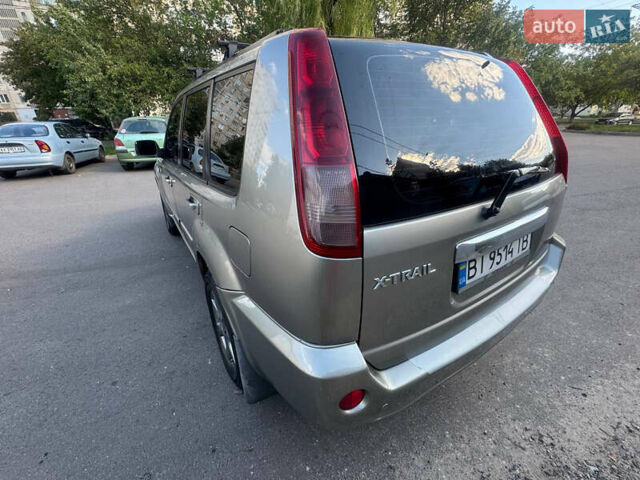 Серый Ниссан ИксТрейл, объемом двигателя 2 л и пробегом 283 тыс. км за 6500 $, фото 6 на Automoto.ua