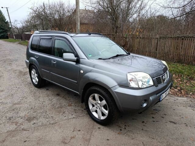 Сірий Ніссан ІксТрейл, об'ємом двигуна 2.5 л та пробігом 211 тис. км за 7500 $, фото 2 на Automoto.ua