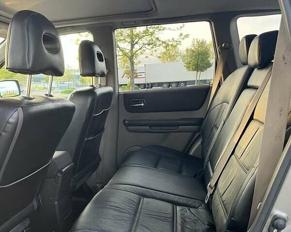 Серый Ниссан ИксТрейл, объемом двигателя 2.5 л и пробегом 360 тыс. км за 6417 $, фото 12 на Automoto.ua