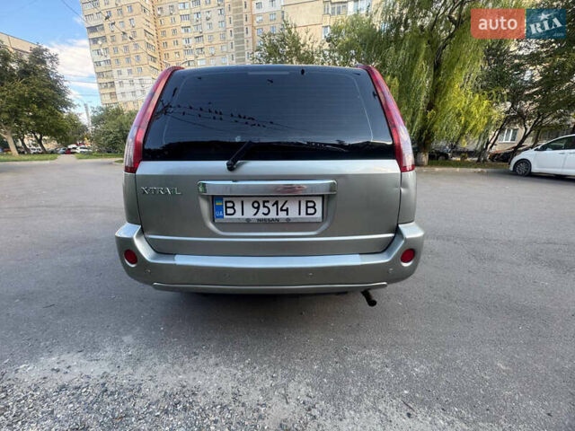 Серый Ниссан ИксТрейл, объемом двигателя 2 л и пробегом 283 тыс. км за 6500 $, фото 9 на Automoto.ua