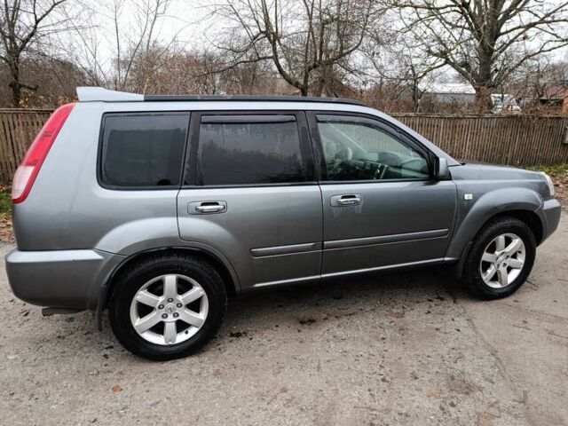 Сірий Ніссан ІксТрейл, об'ємом двигуна 2.5 л та пробігом 211 тис. км за 7500 $, фото 3 на Automoto.ua