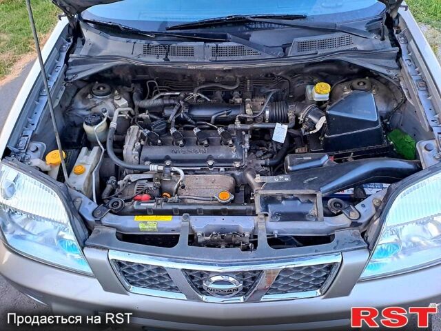 Серый Ниссан ИксТрейл, объемом двигателя 2 л и пробегом 214 тыс. км за 6585 $, фото 8 на Automoto.ua