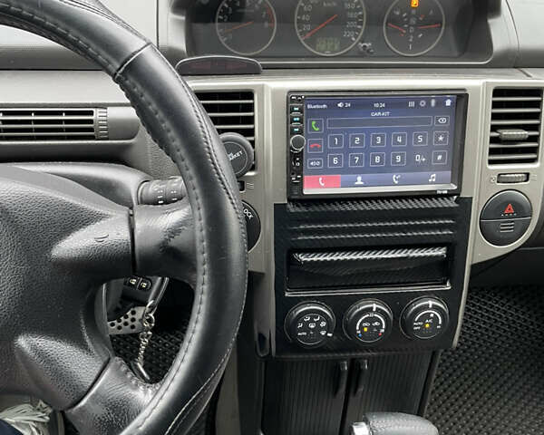 Серый Ниссан ИксТрейл, объемом двигателя 2 л и пробегом 208 тыс. км за 6600 $, фото 10 на Automoto.ua