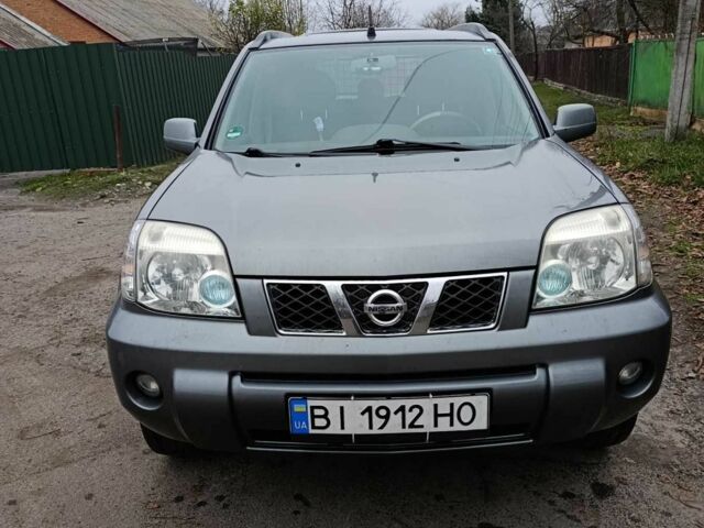 Сірий Ніссан ІксТрейл, об'ємом двигуна 2.5 л та пробігом 211 тис. км за 7500 $, фото 1 на Automoto.ua