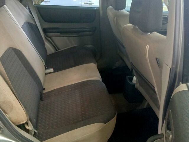 Серый Ниссан ИксТрейл, объемом двигателя 2.2 л и пробегом 255 тыс. км за 4000 $, фото 5 на Automoto.ua