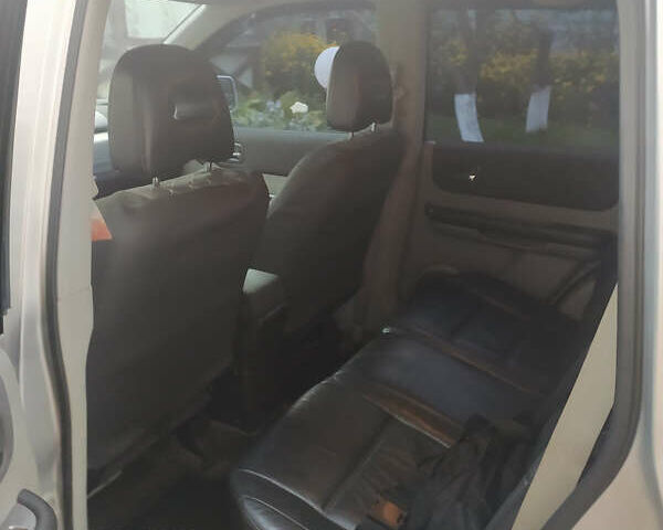 Сірий Ніссан ІксТрейл, об'ємом двигуна 2.49 л та пробігом 250 тис. км за 7500 $, фото 6 на Automoto.ua