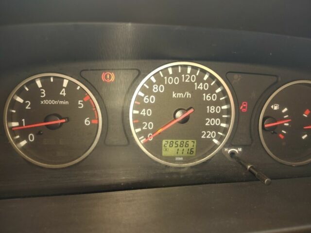 Серый Ниссан ИксТрейл, объемом двигателя 2.2 л и пробегом 286 тыс. км за 6000 $, фото 9 на Automoto.ua