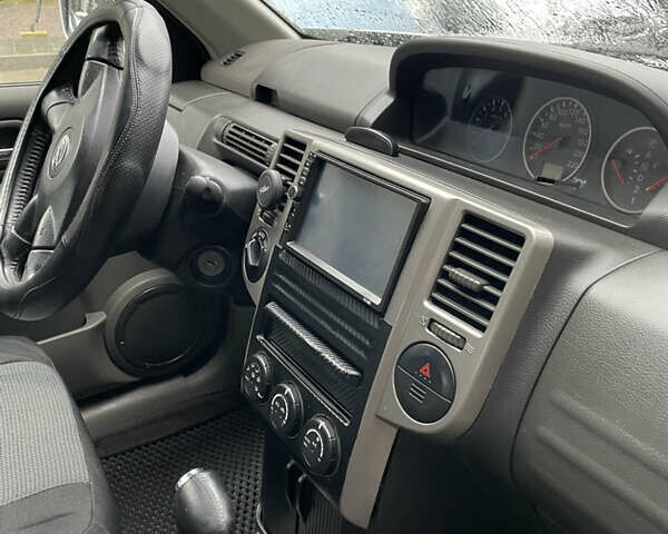 Серый Ниссан ИксТрейл, объемом двигателя 2 л и пробегом 208 тыс. км за 6600 $, фото 9 на Automoto.ua